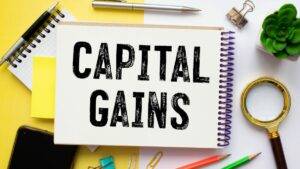 Capital gains written on a notepad